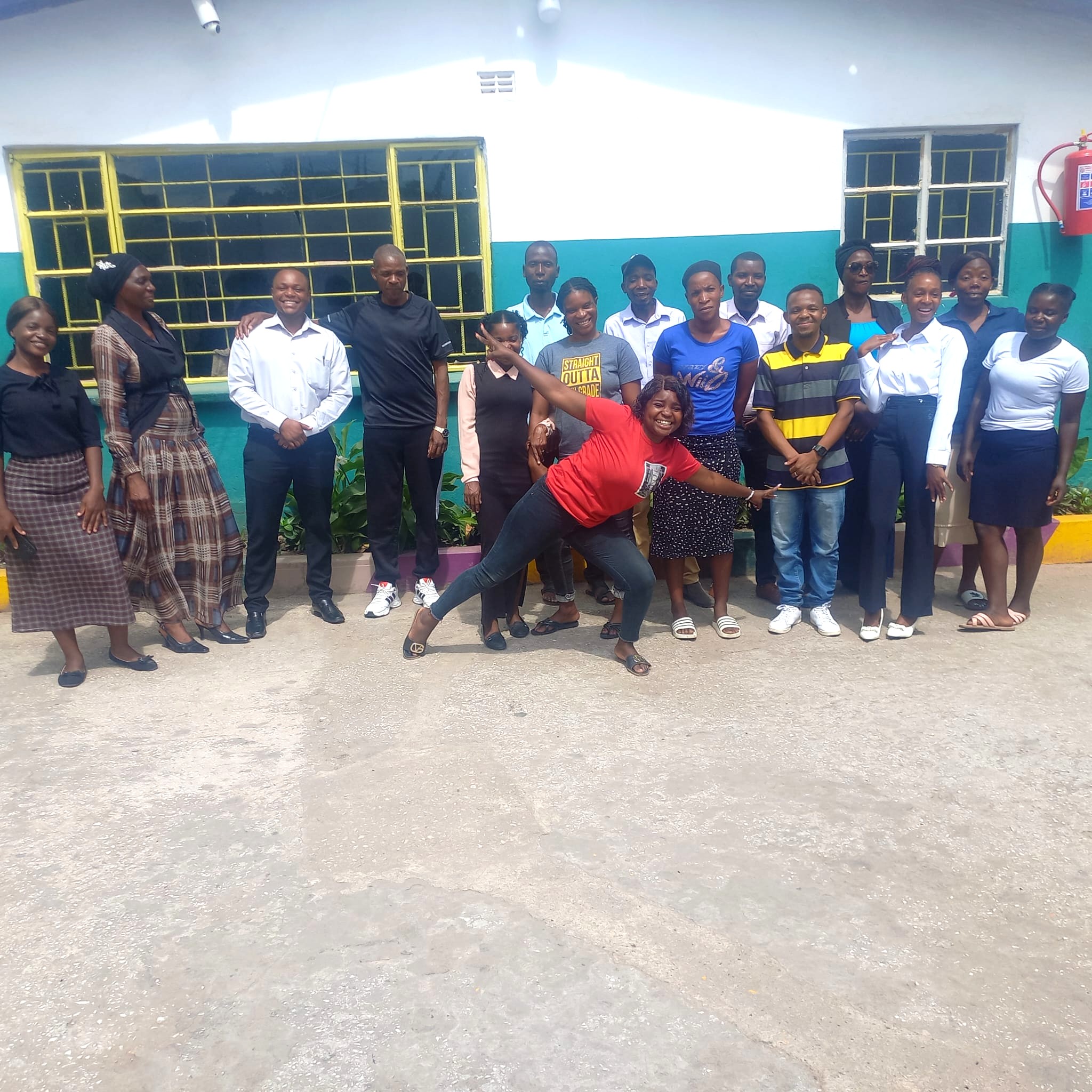 EEN team with school staff at a partner school in Lusaka